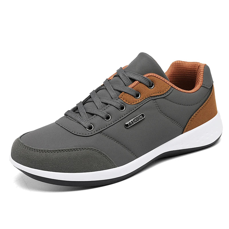tenis masculino cinza detalhes marrom 2
