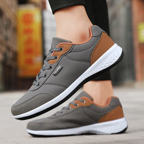 tenis masculino cinza