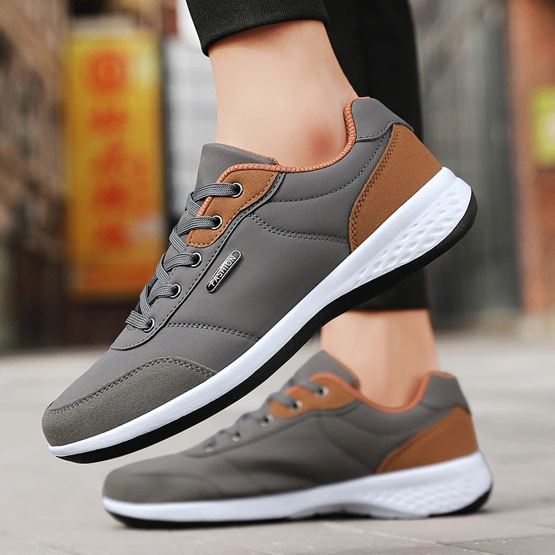 tenis masculino cinza